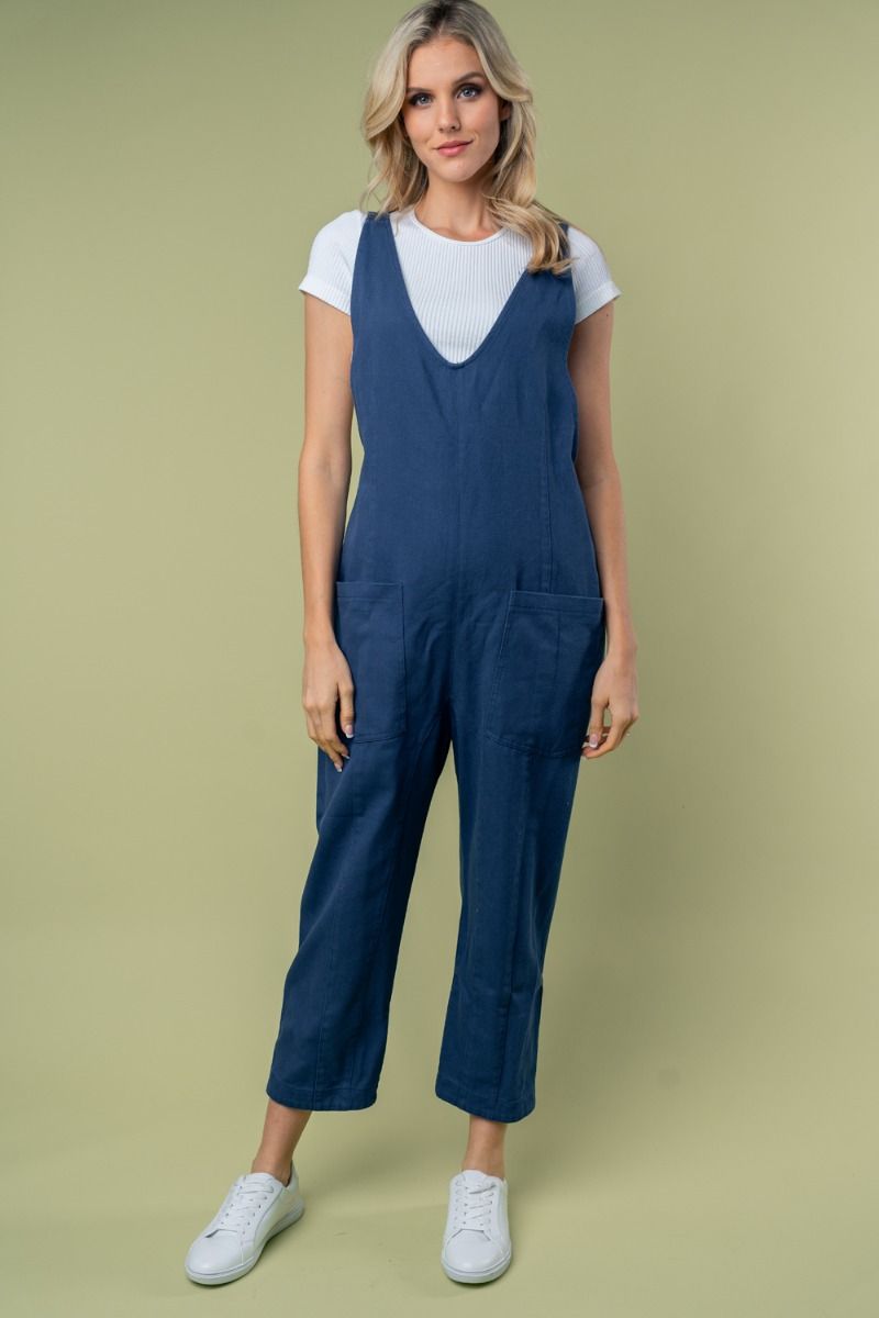 SLEEVELESS SOLID KNIT JUMPSUIT WITH SCOOP V-NECK