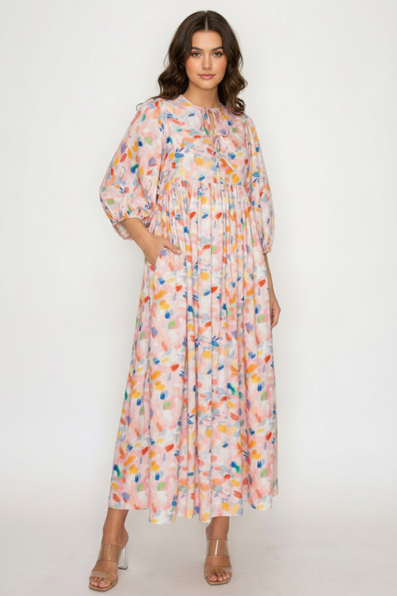 FLOWY MIDI DRESS FEATURES A SOFT BLUSH BASE-SHD1035