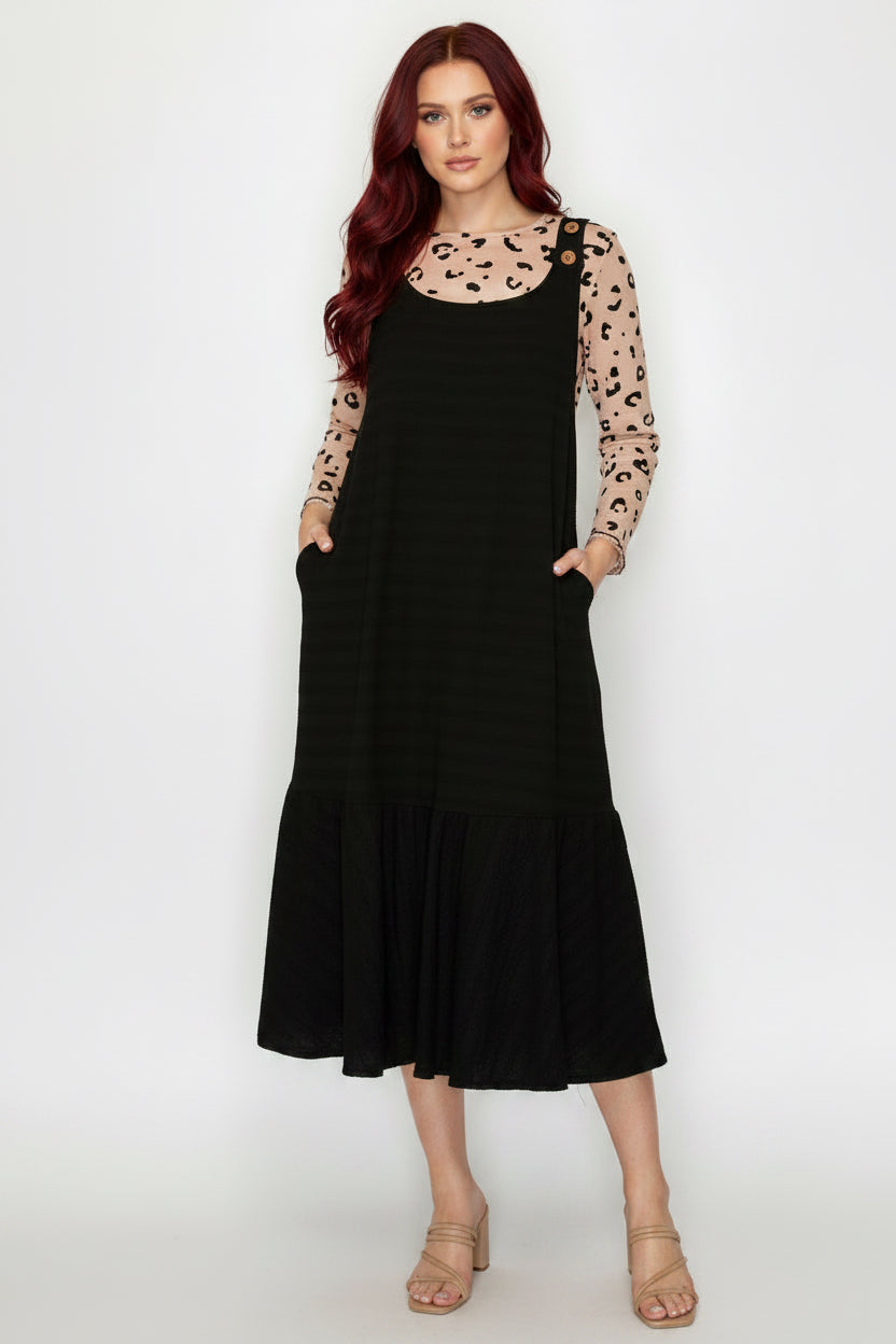 EFFORTLESS STYLE MEETS COMFORT IN THIS RELAXED JUMPER DRESS