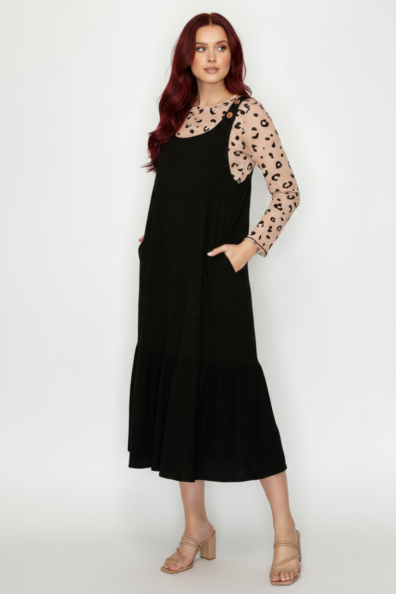 EFFORTLESS STYLE MEETS COMFORT IN THIS RELAXED JUMPER DRESS