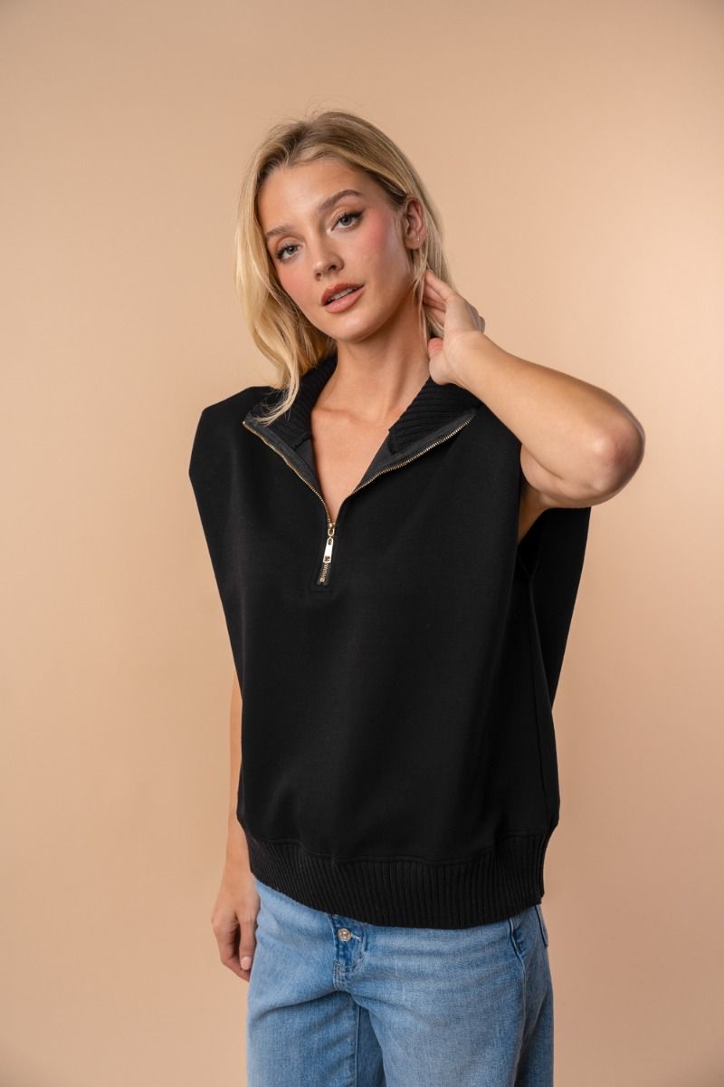 SLEEVELESS SOLID KNIT TOP