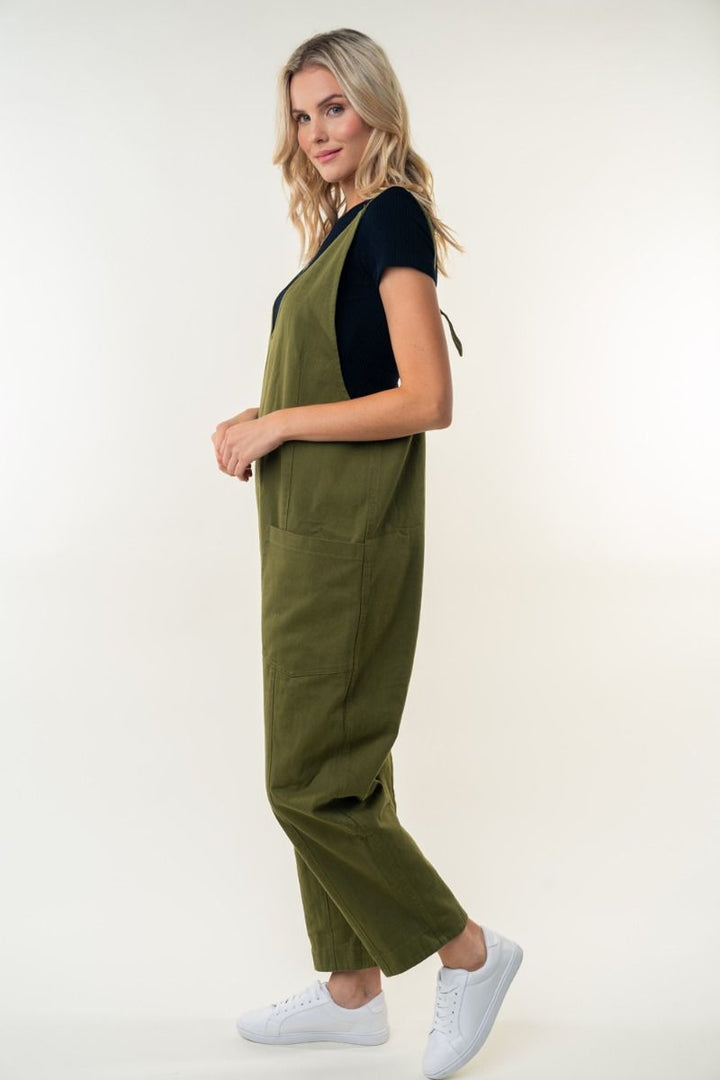 SLEEVELESS SOLID KNIT JUMPSUIT WITH SCOOP V-NECK