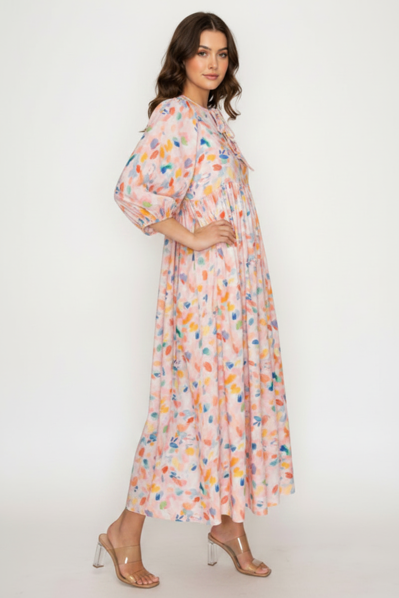 FLOWY MIDI DRESS FEATURES A SOFT BLUSH BASE-SHD1035