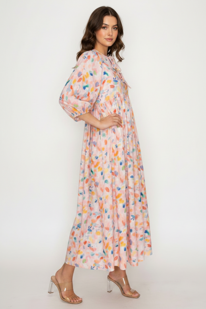 FLOWY MIDI DRESS FEATURES A SOFT BLUSH BASE-SHD1035