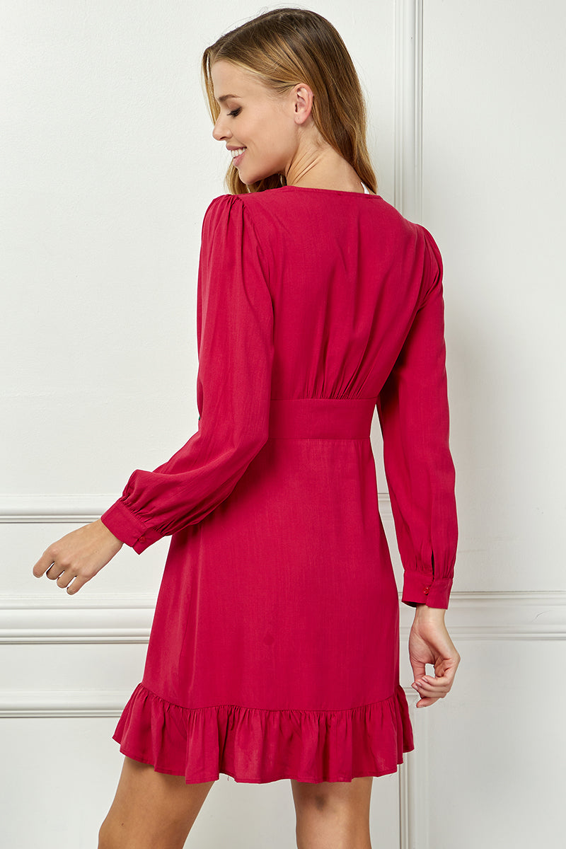Long sleeve embroidered button down dress.