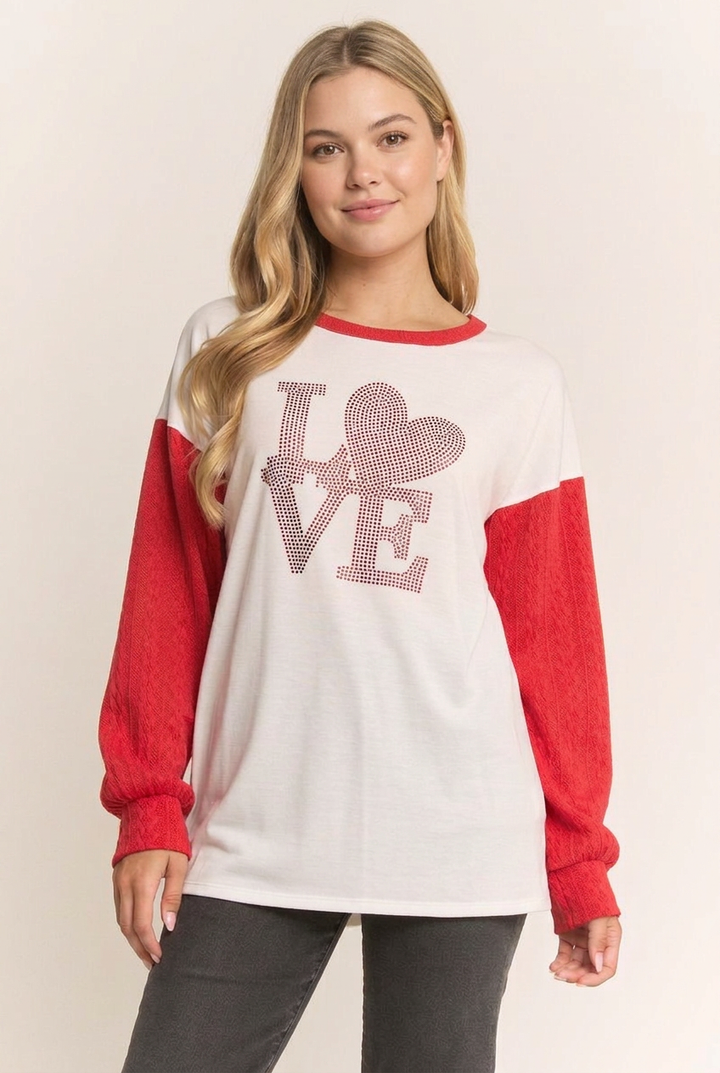 New-face blonde model revision wearing the LOVE top