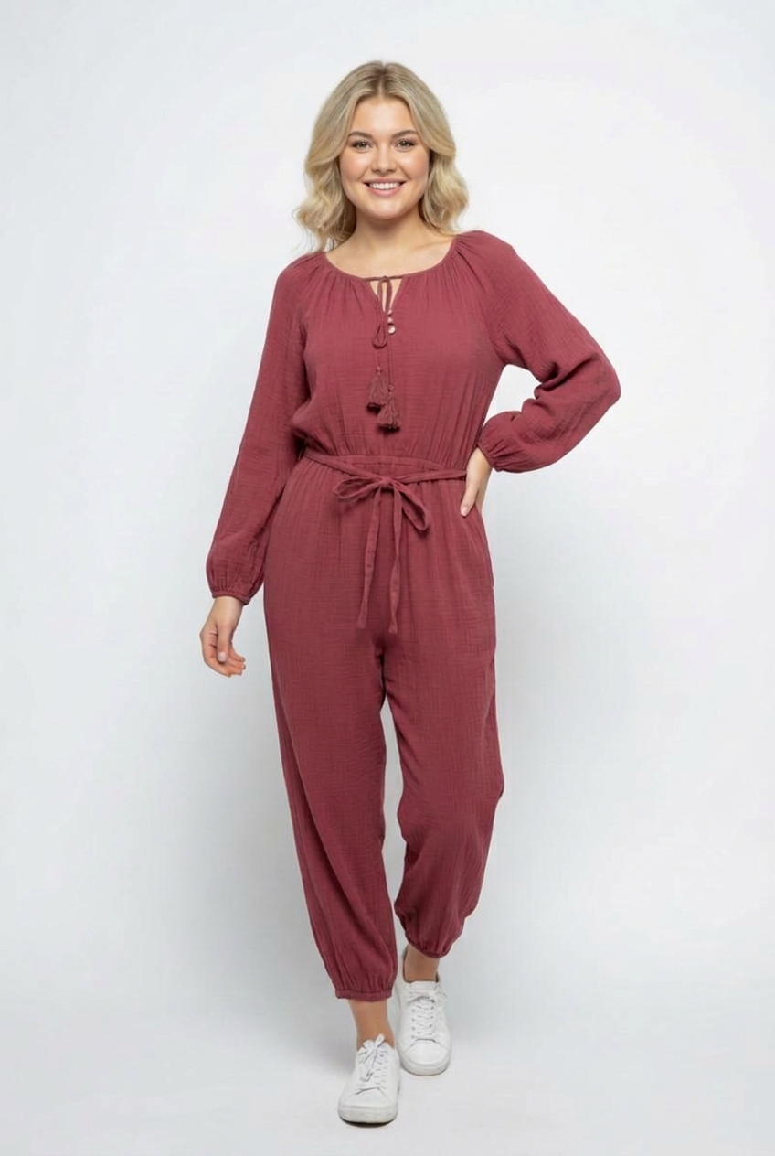 New-face blonde model wearing the dusty-rose jumpsuit