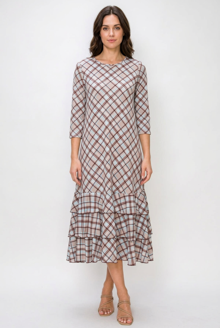 New regular-size model wearing the plaid ruffle dress