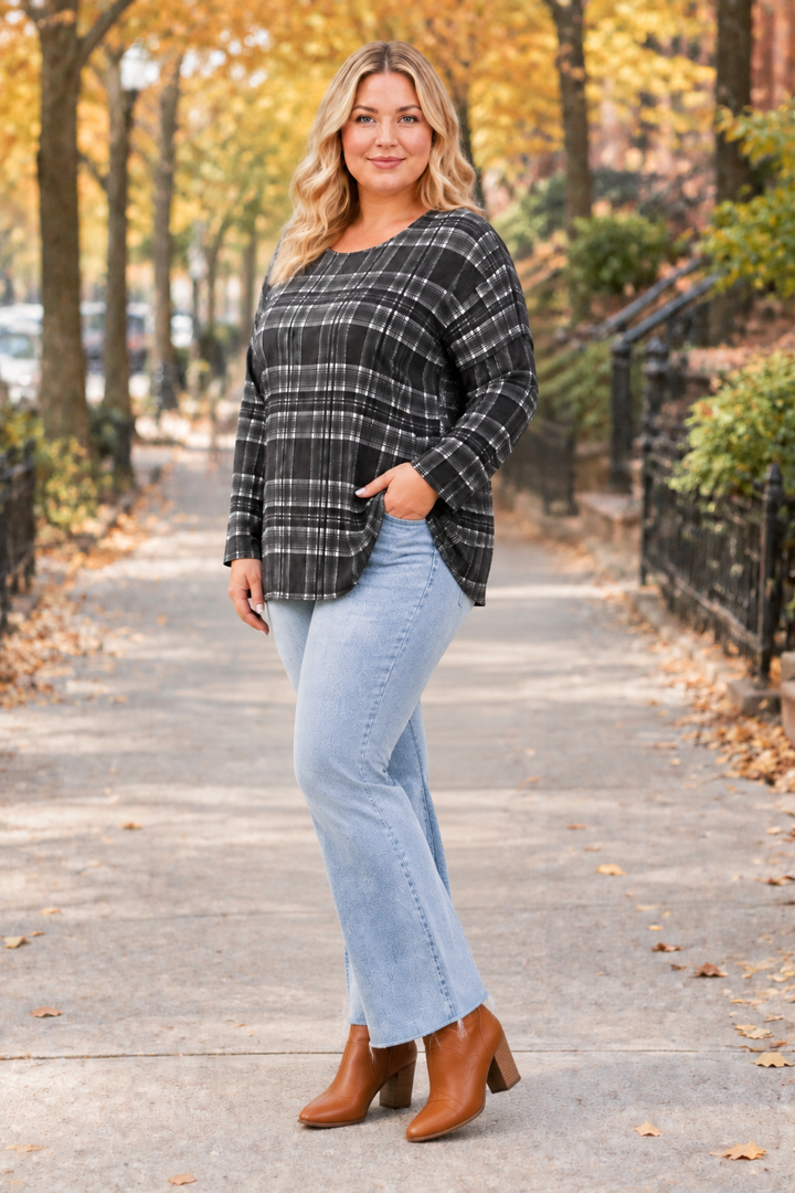 Plaid top, jeans, plus-size blonde model, half-side pose face forward, autumn street background