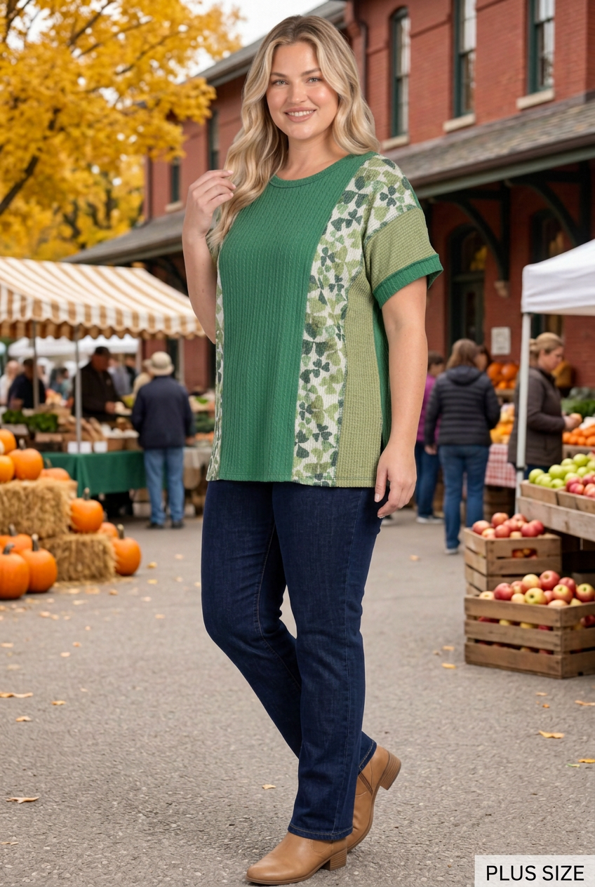 Plus-size blonde model in a half-side pose at the autumn market