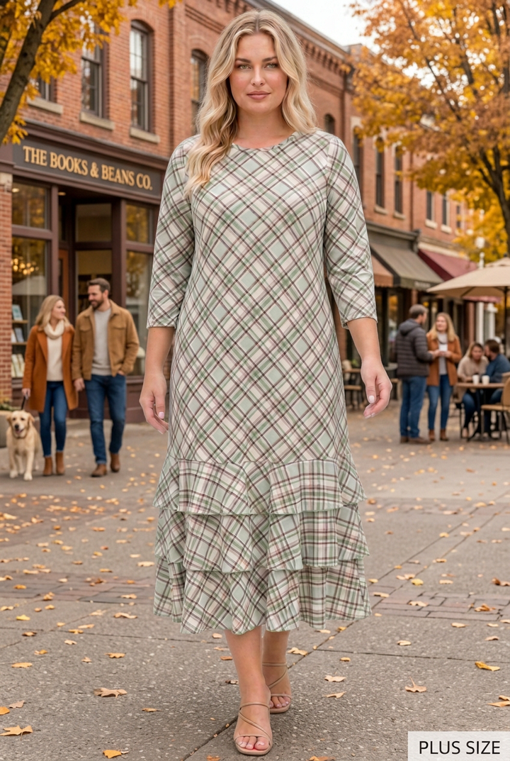 Plus-size blonde model wearing the green plaid dress in an autumn town square