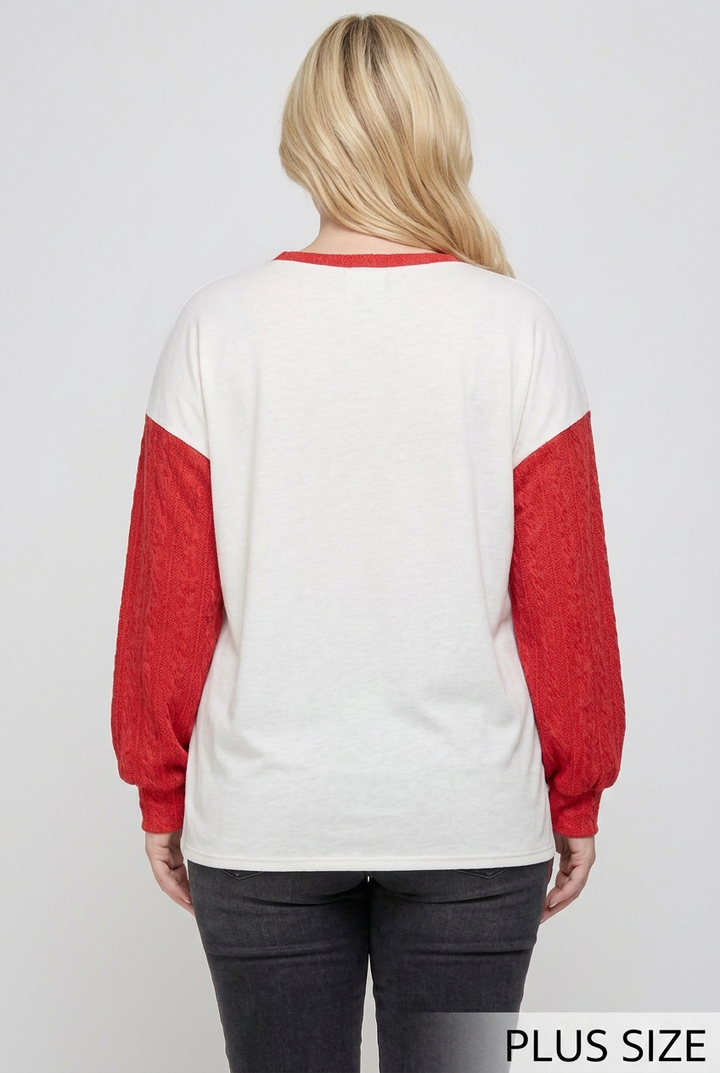 Plus-size full-back studio view of the ivory top with red sleeves