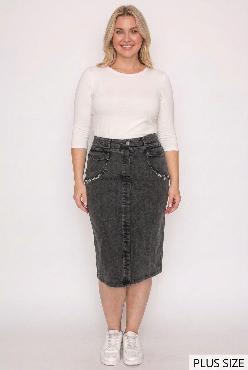 Plus-size model wearing the black denim skirt