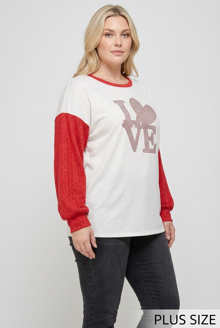 Plus-size side studio pose wearing the LOVE top
