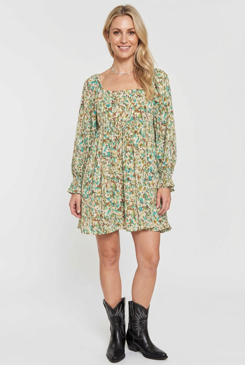 Printed mini dress on a new regular-size blonde model