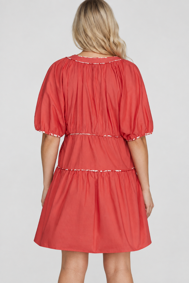 Product photo, blonde model, full back pose, studio background, coral dress preserved