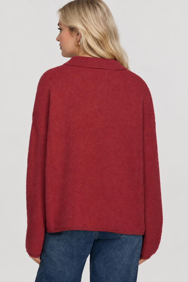 Product photo, blonde model, full back pose, studio background, deep red sweater preserved