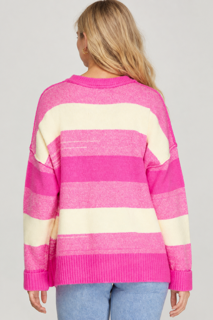 Product photo, blonde model, full back pose, studio background, pink and cream striped sweater preserved