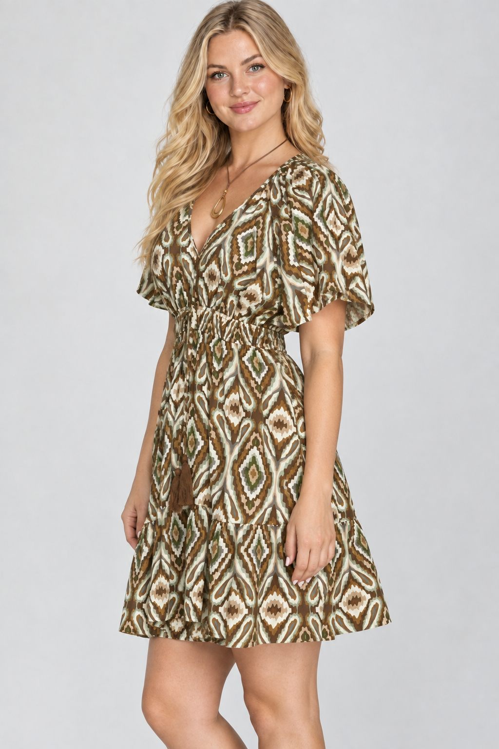 Product photo, blonde model, side pose face forward, studio background, ikat print dress preserved