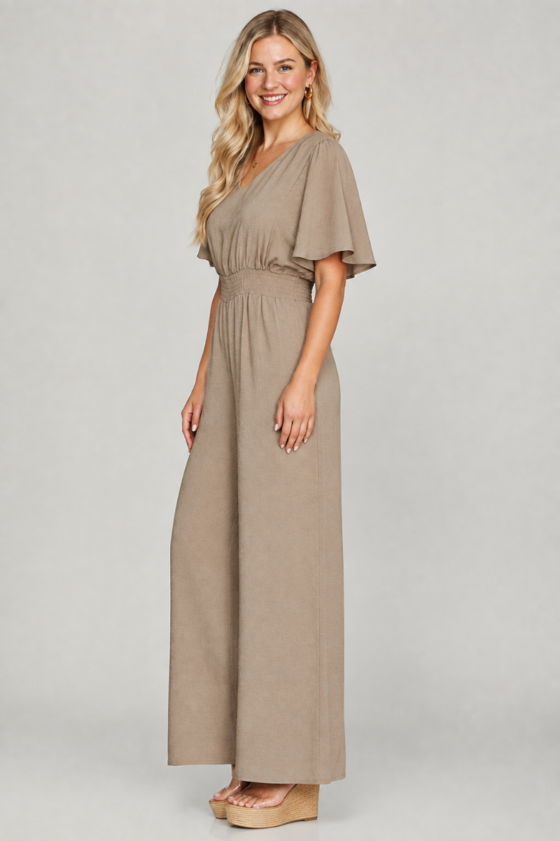 Product photo, blonde model, side pose face forward, studio background, outfit preserved