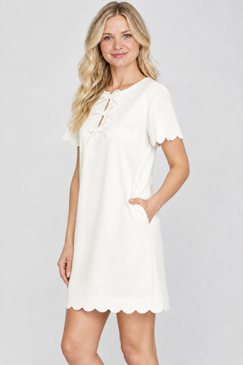 Product photo, blonde model, side pose face forward, studio background, outfit preserved