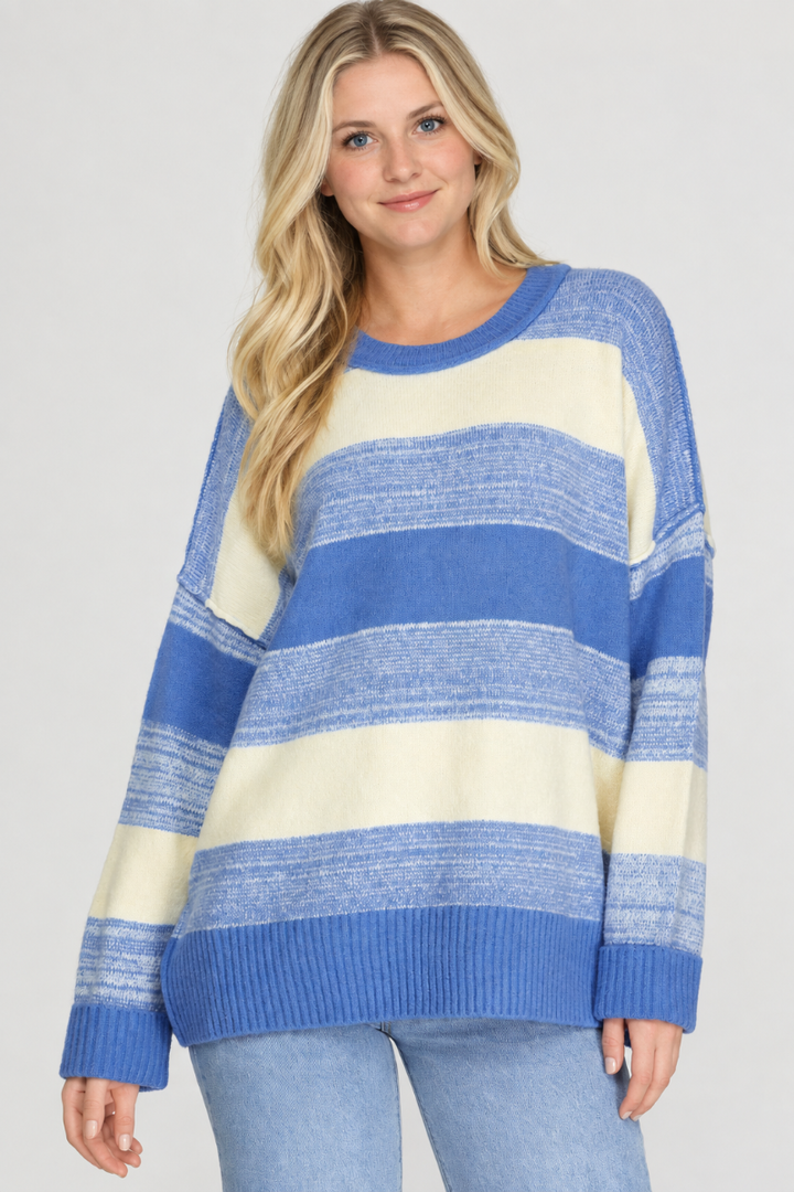 Product photo, new blonde model, studio background, blue and cream striped sweater preserved