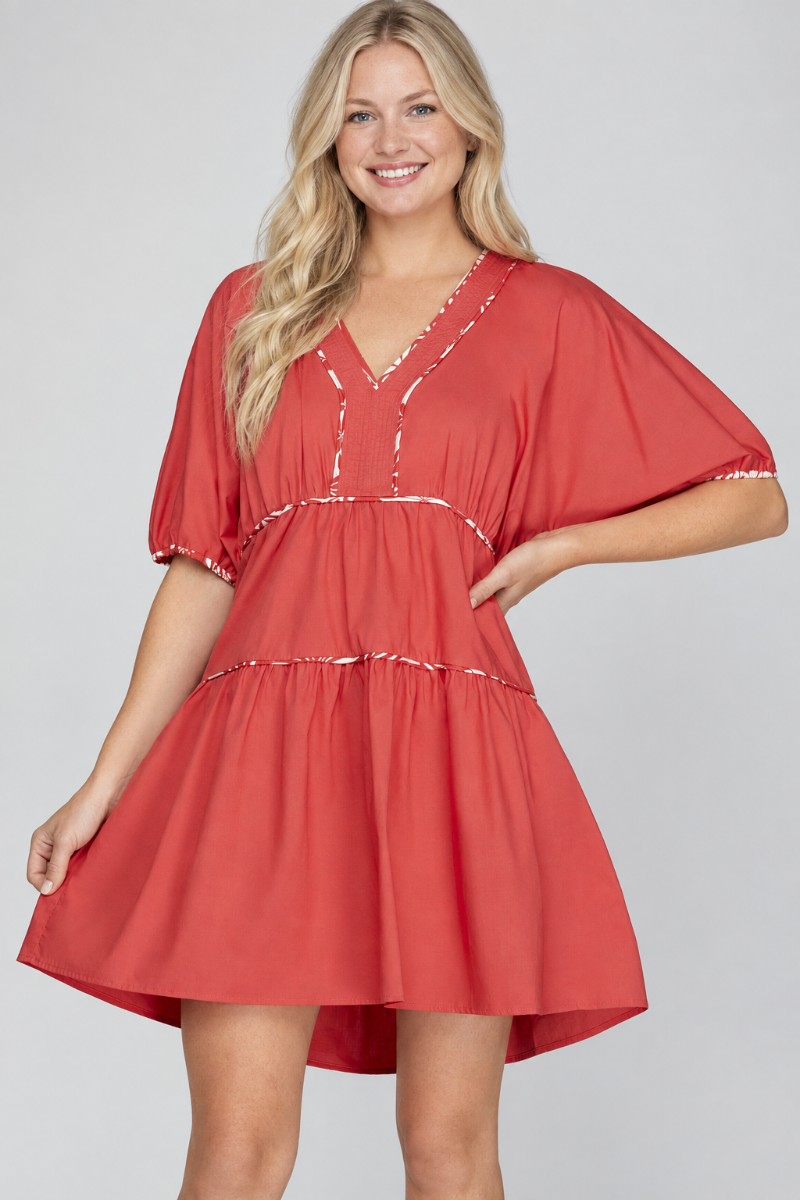 Product photo, new blonde model, studio background, coral dress preserved