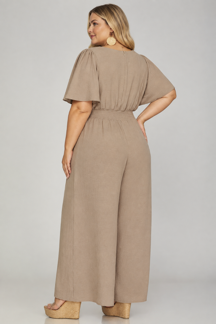 Product photo, plus size blonde model, full back pose, studio background