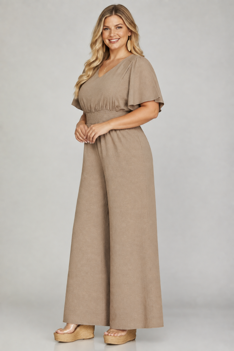 Product photo, plus size blonde model, side pose face forward, studio background