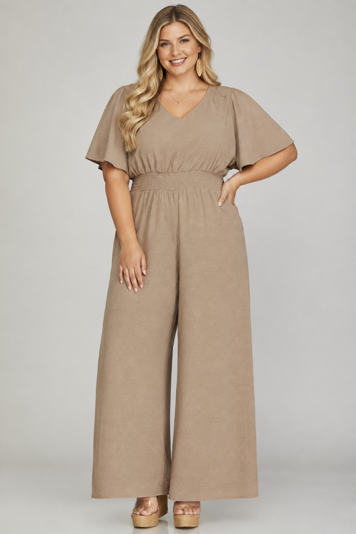 Product photo, plus size blonde model, studio background, same jumpsuit design
