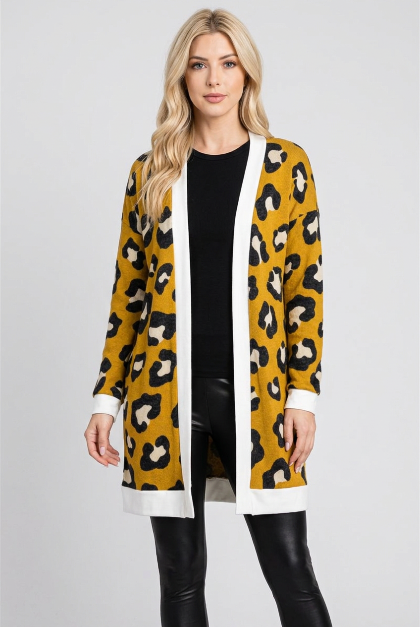 Regular-size blonde model wearing the mustard leopard cardigan without a beanie