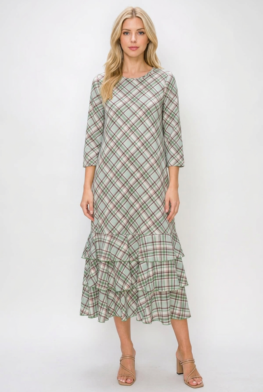 Regular-size blonde model wearing the plaid dress