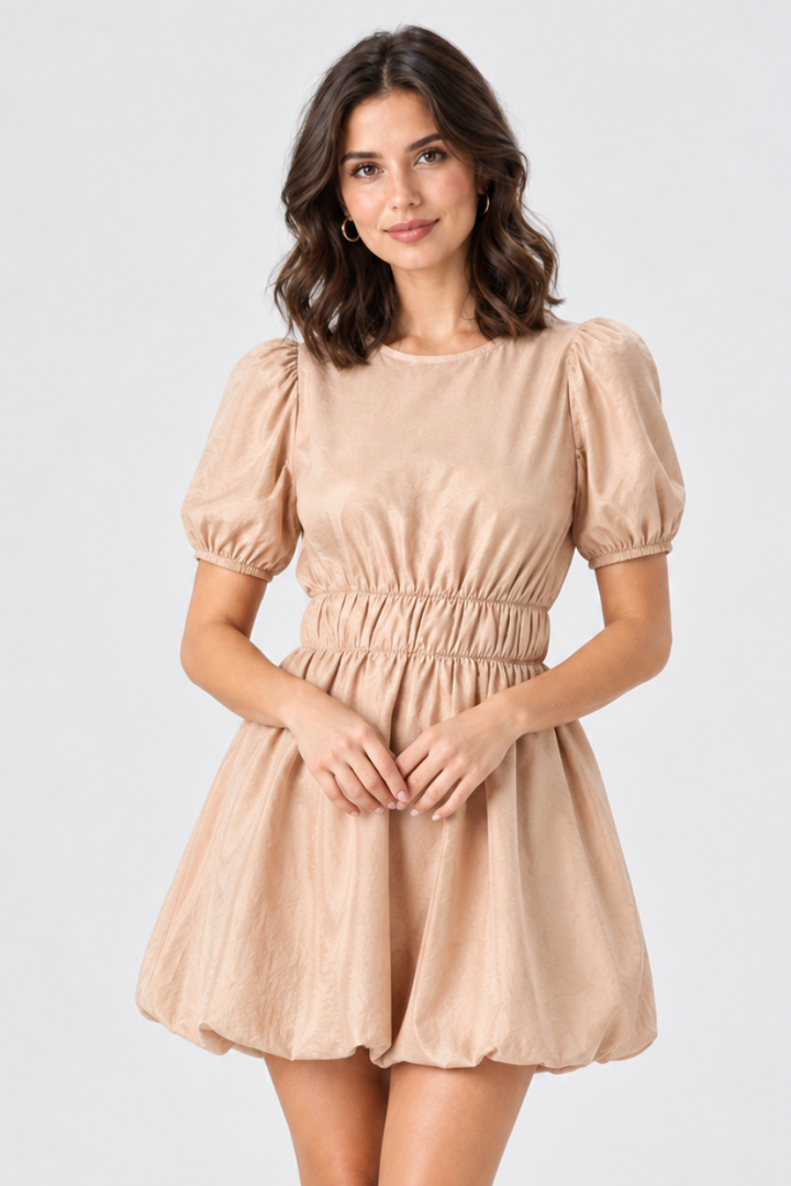 Studio front view, same model, beige puff-sleeve dress, hands loosely clasped at waist
