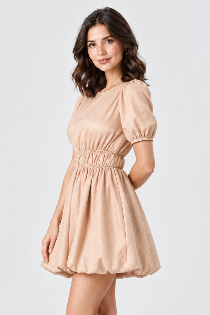 Studio side view, same model, beige puff-sleeve dress, hand behind back