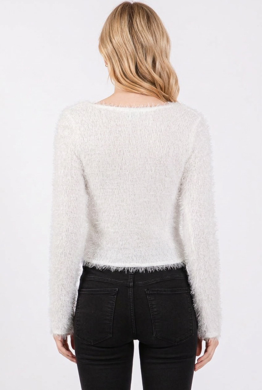 White fuzzy cardigan full-back studio view